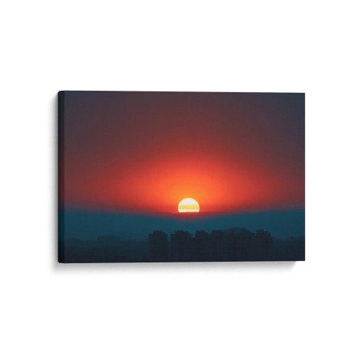 Obraz na płótnie canvas Zachód nad miastem realistyczny