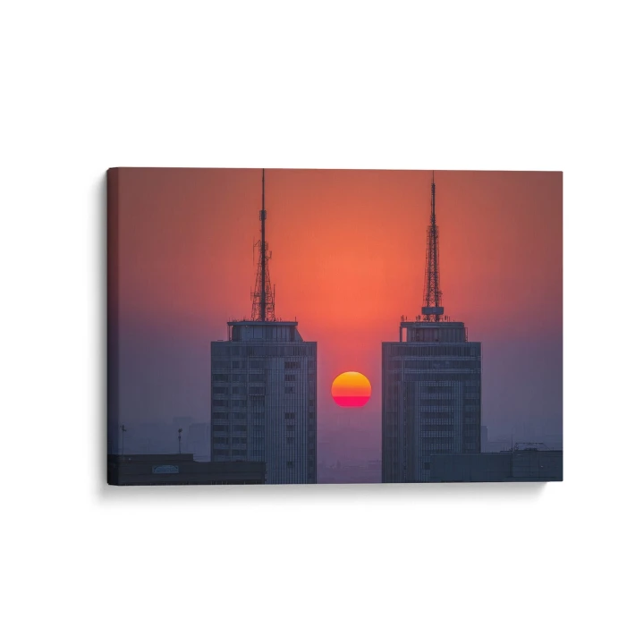Obraz na płótnie canvas Wieżowce o zachodzie realistyczny