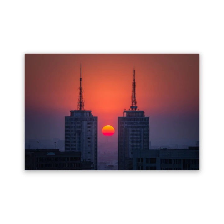 Obraz na płótnie canvas Wieżowce o zachodzie realistyczny